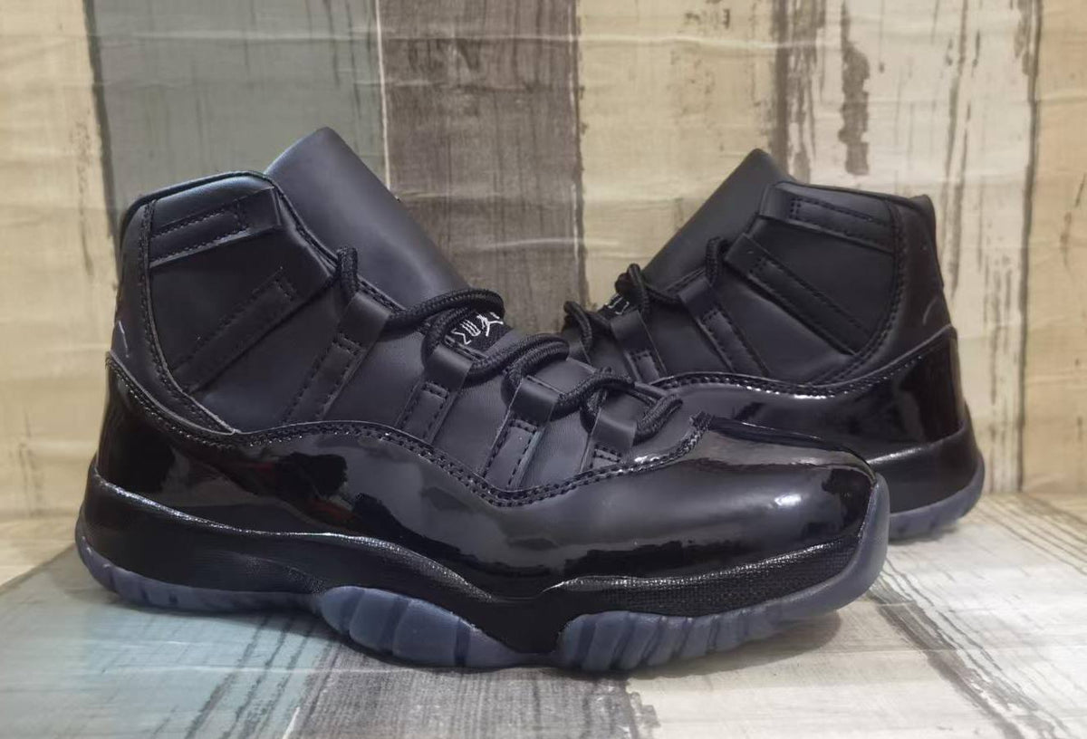 Air Jordan 11 Retro x Comme des Garçons Homme Plus 'Black'